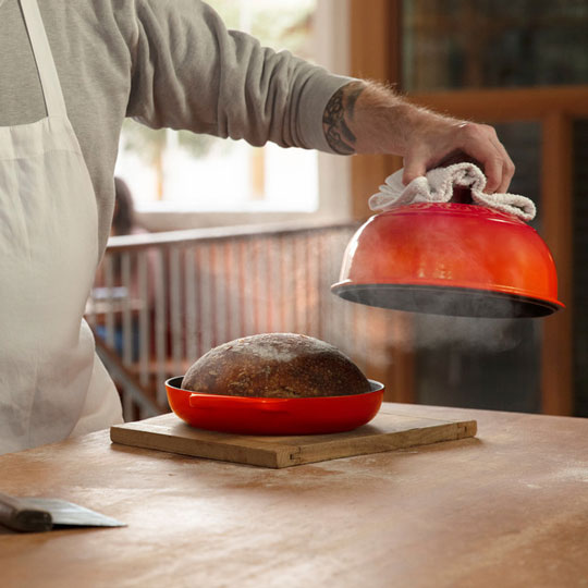 steam is released as Chad Robertson lifts the lid on a Le Creuset bread oven